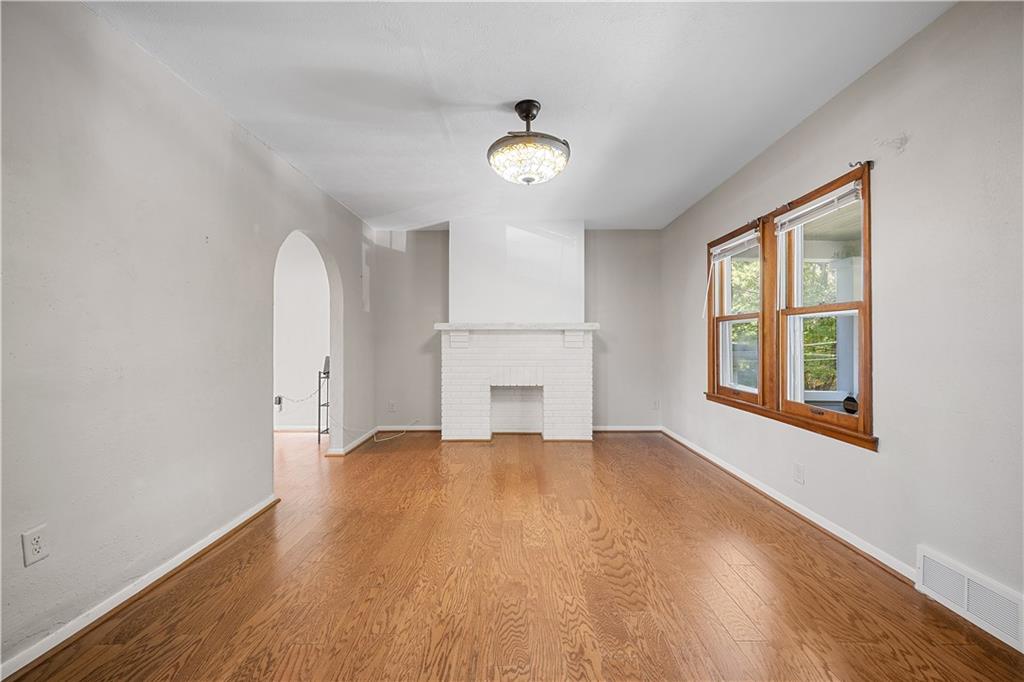 920 Watson Street Coraopolis, PA 15108 - Photo 6 of 36 wooden floor in an empty room with a window