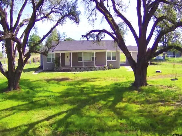 a view of a house with garden