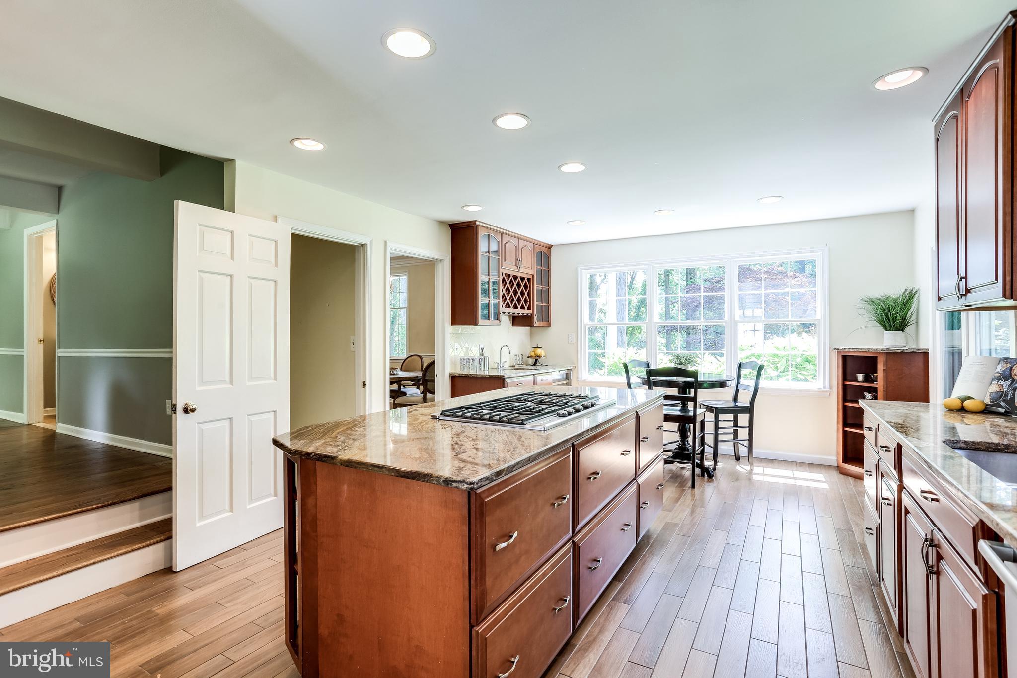120 Dalkeith Glen Arnold, MD 21012 - Photo 12 of 52 Gourmet Kitchen w/ breakfast area/bar beyond