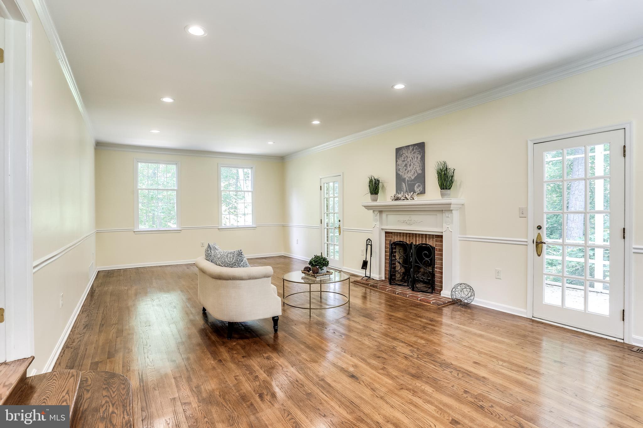120 Dalkeith Glen Arnold, MD 21012 - Photo 5 of 52 Living Rm w/fireplace & access to screened porch