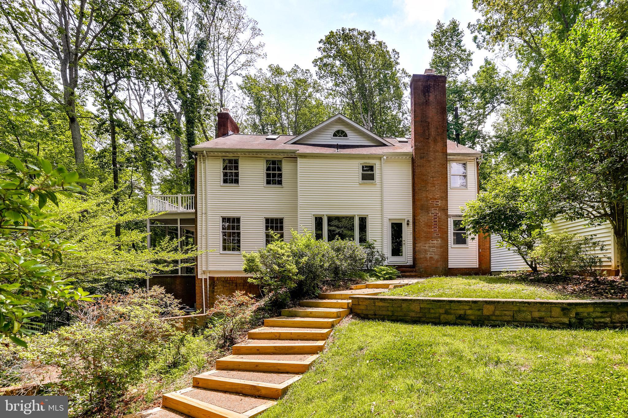 120 Dalkeith Glen Arnold, MD 21012 - Photo 41 of 52 Backyard with multiple tiered lawn & paver areas