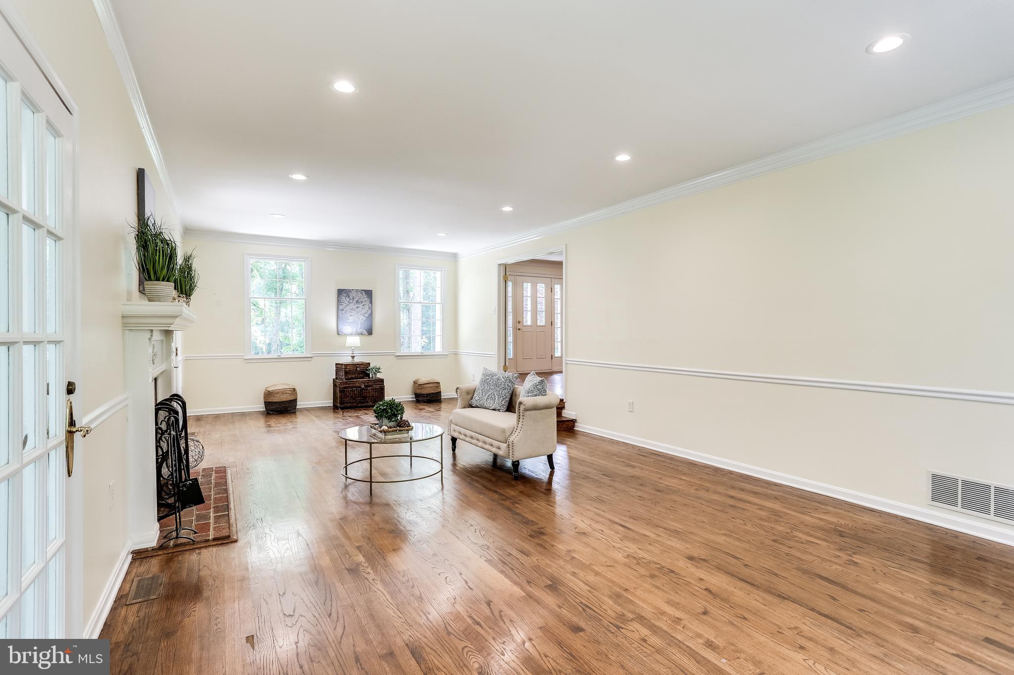 120 Dalkeith Glen Arnold, MD 21012 - Photo 6 of 52 Living Rm w/fireplace & access to screened porch