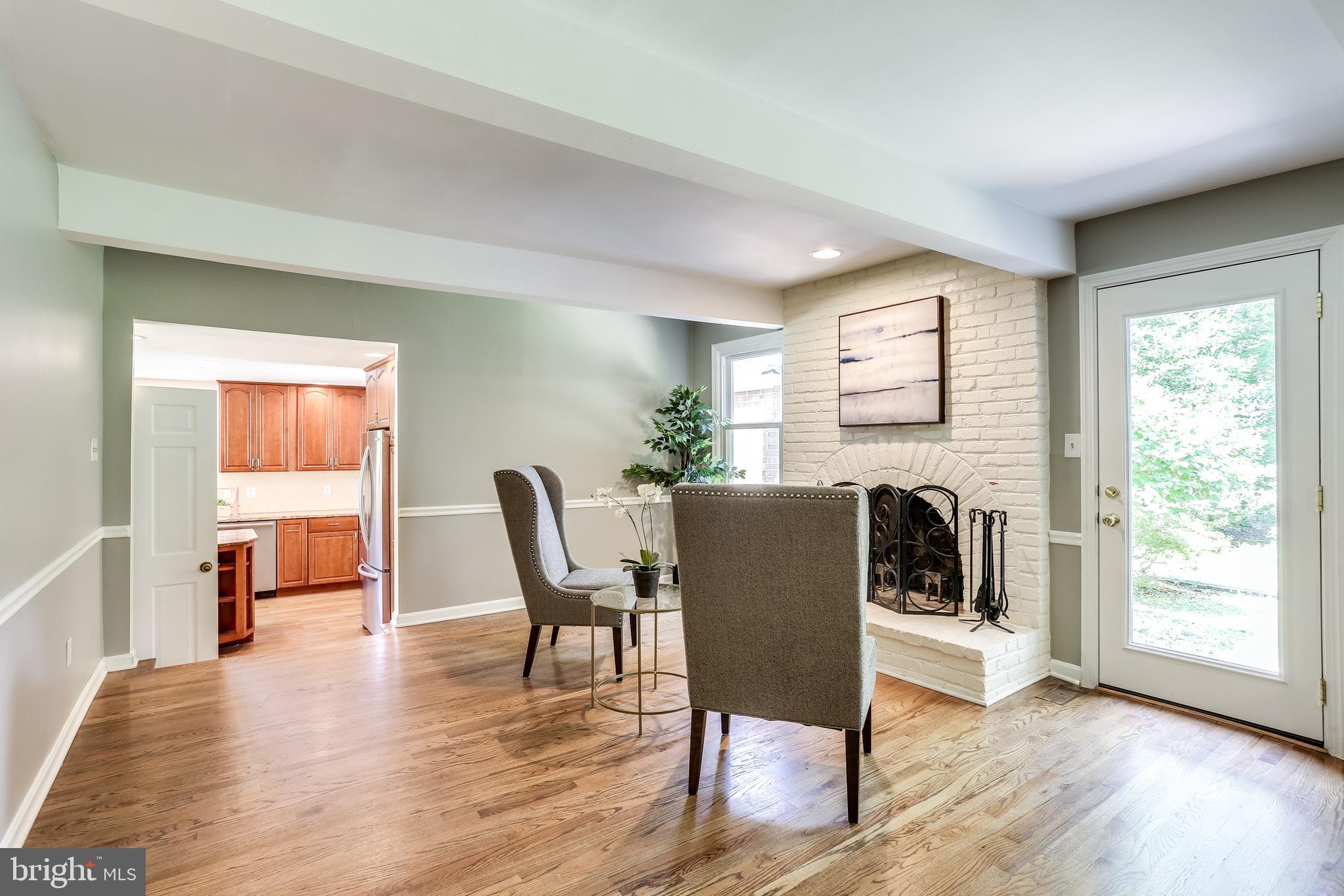 120 Dalkeith Glen Arnold, MD 21012 - Photo 9 of 52 Family Room with beamed ceiling and fireplace