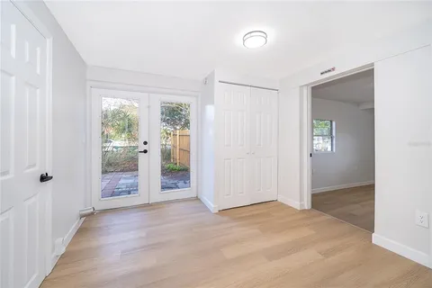 wooden floor and closet in a room