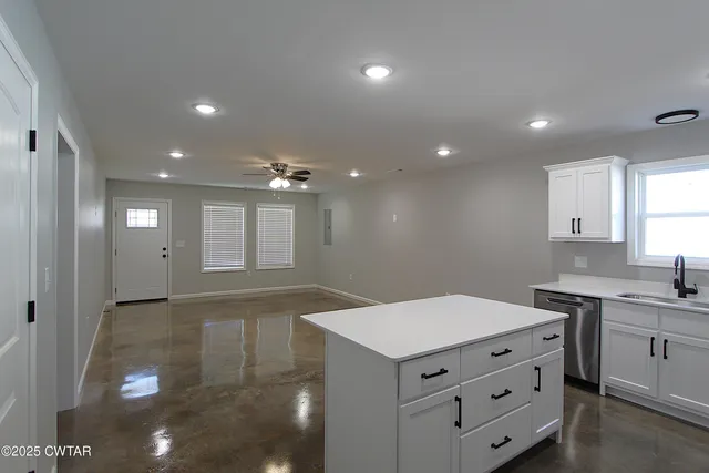 a bathroom with a sink and mirror