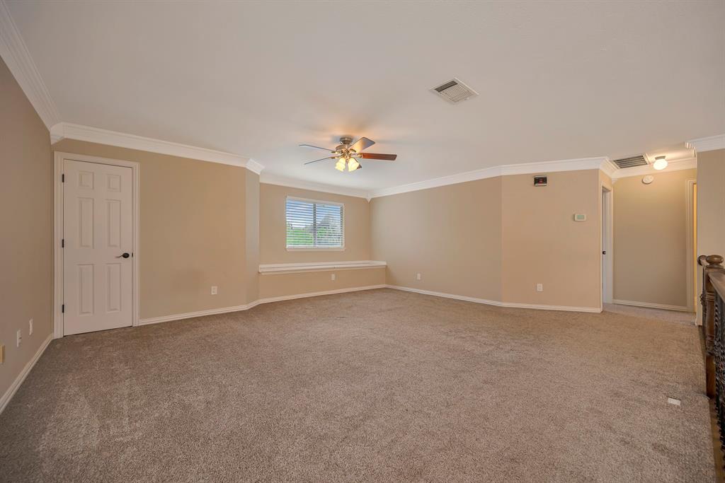4008 Ramsgate Court Colleyville, TX 76034 - Photo 22 of 33 Upstairs carpeted room featuring a ceiling fan, crown molding, a window with blinds, and neutral wall tones