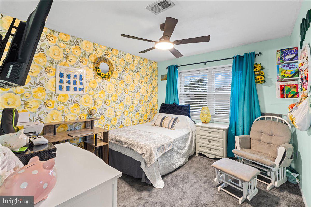 2116 Silver Court Hamilton, NJ 08690 - Photo 17 of 26 a bedroom with a bed and a window