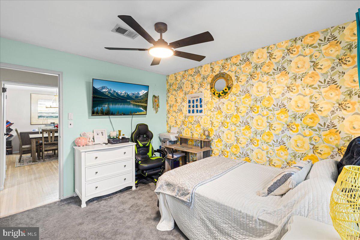 2116 Silver Court Hamilton, NJ 08690 - Photo 18 of 26 a bedroom with a bed and a flat screen tv