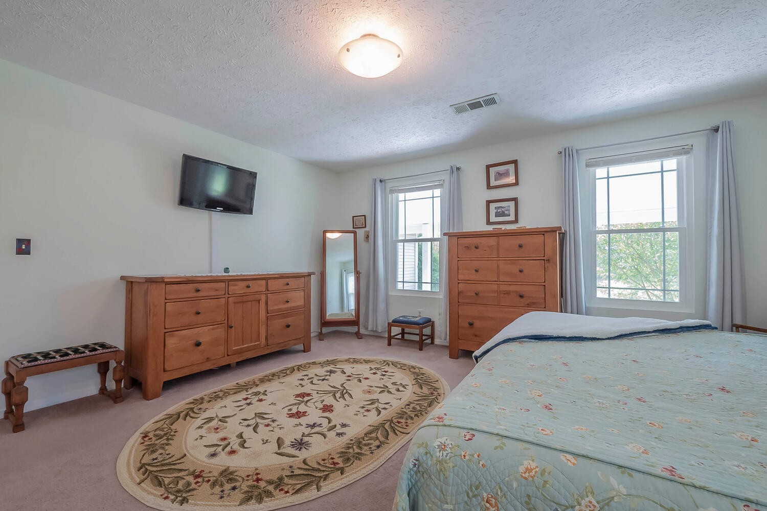5970 Milton Fox Road Franklin, TN 37064 - Photo 17 of 49 a bedroom with a bed and furniture