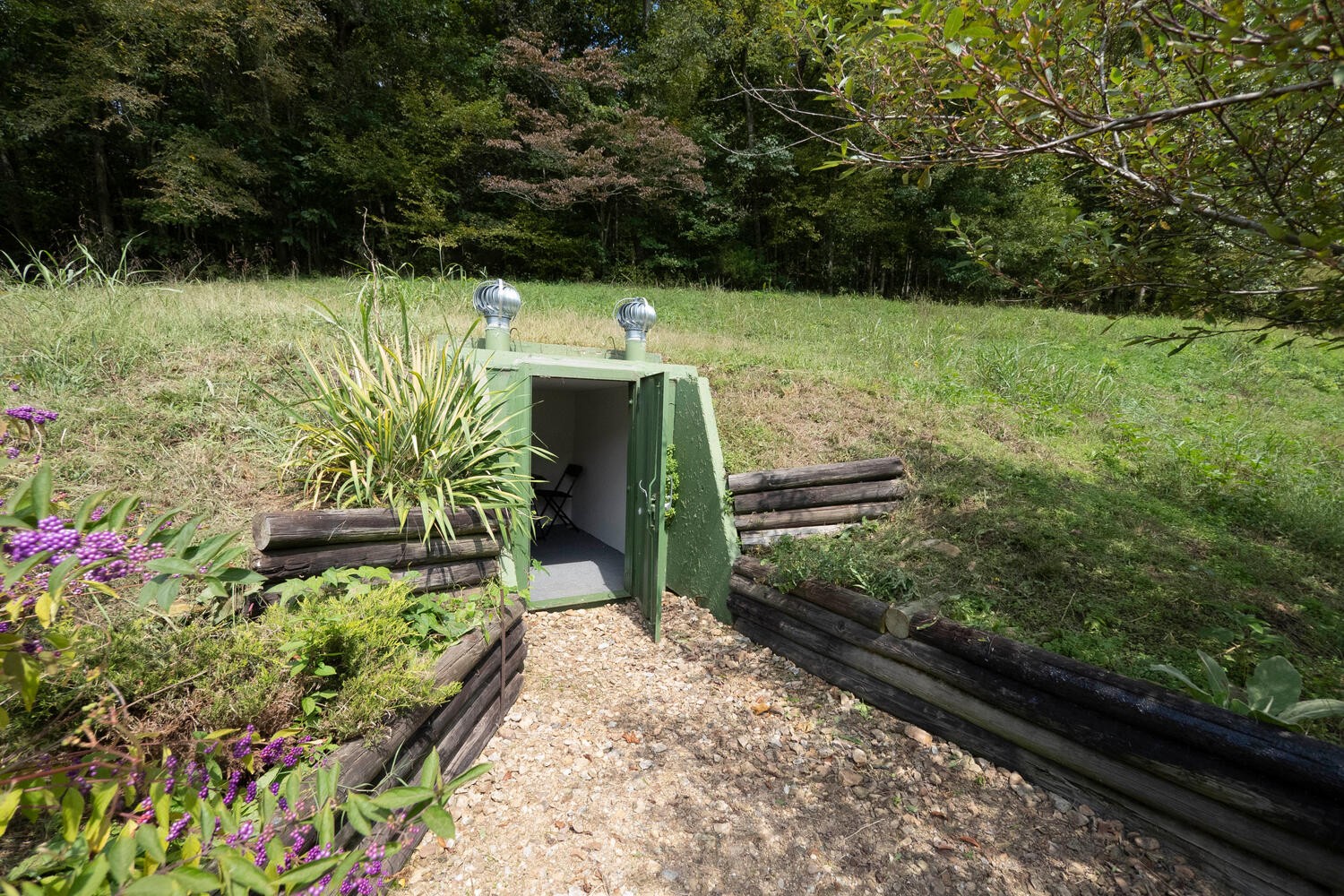 5970 Milton Fox Road Franklin, TN 37064 - Photo 32 of 49 a view of a garden with an outdoor seating
