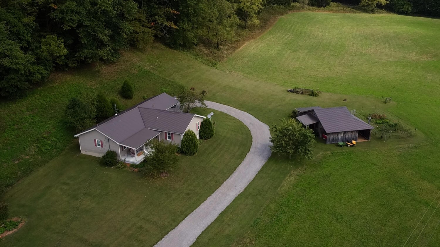 5970 Milton Fox Road Franklin, TN 37064 - Photo 5 of 49 an aerial view of a house with garden space and lake view