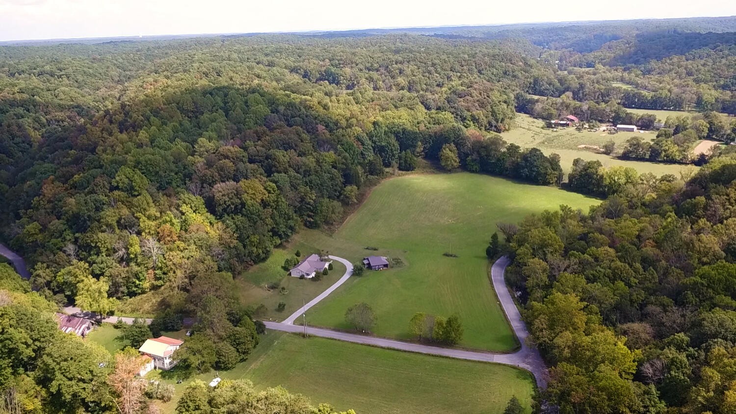 5970 Milton Fox Road Franklin, TN 37064 - Photo 43 of 49 an aerial view of residential houses with outdoor space and trees