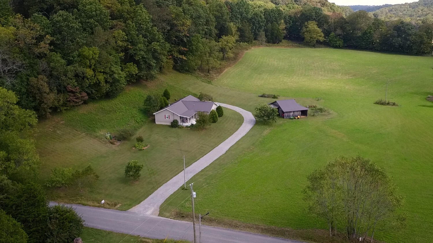 5970 Milton Fox Road Franklin, TN 37064 - Photo 45 of 49 a view of a golf course with a lake