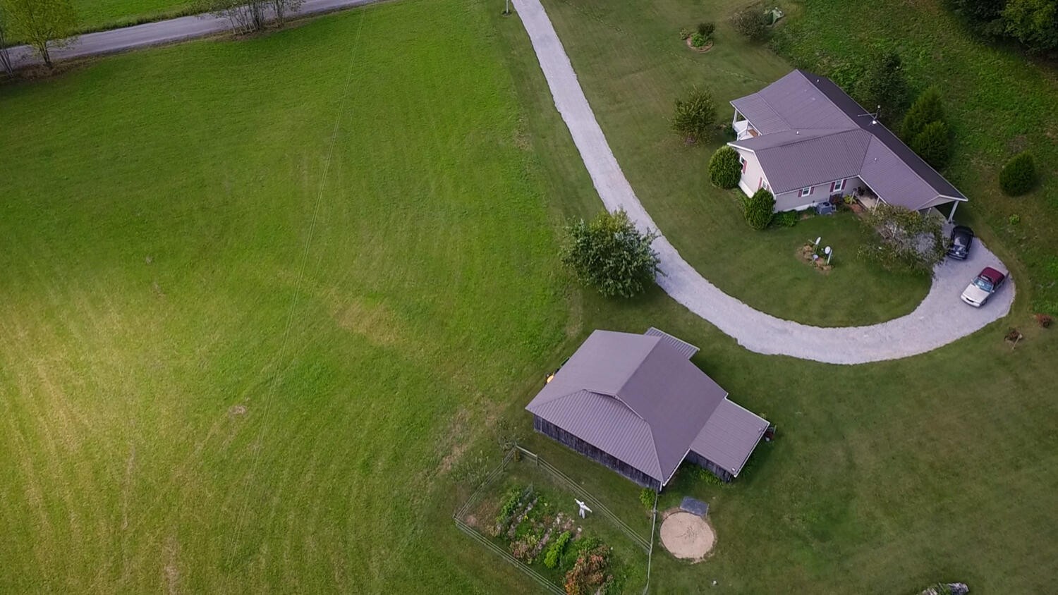 5970 Milton Fox Road Franklin, TN 37064 - Photo 47 of 49 a aerial view of a house with backyard space and swimming pool