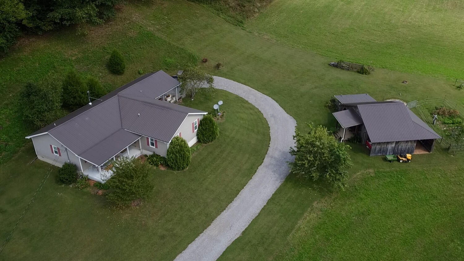 5970 Milton Fox Road Franklin, TN 37064 - Photo 48 of 49 an aerial view of a house with a garden