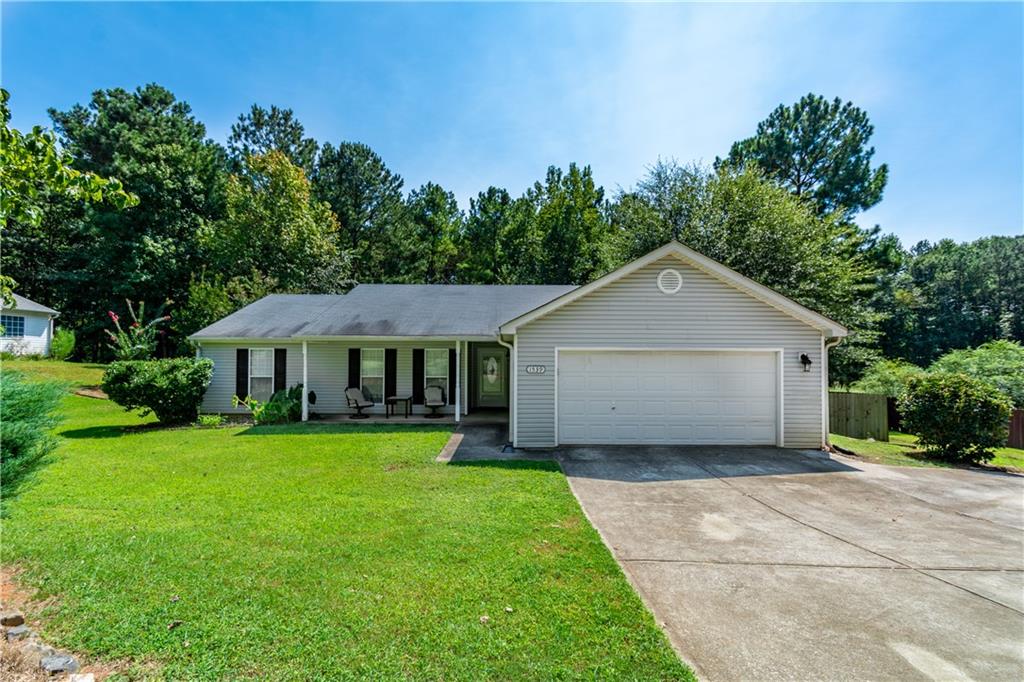 1539 Mill Creek Road Bethlehem, GA 30620 - Photo 1 of 1 a view of a house with yard and tree s