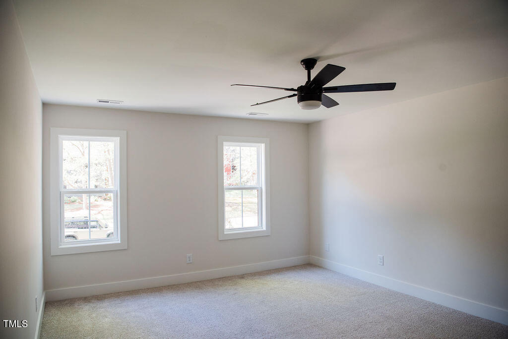 1326 Apache Lane Apex, NC 27502 - Photo 14 of 36 a view of a room that has a window in it