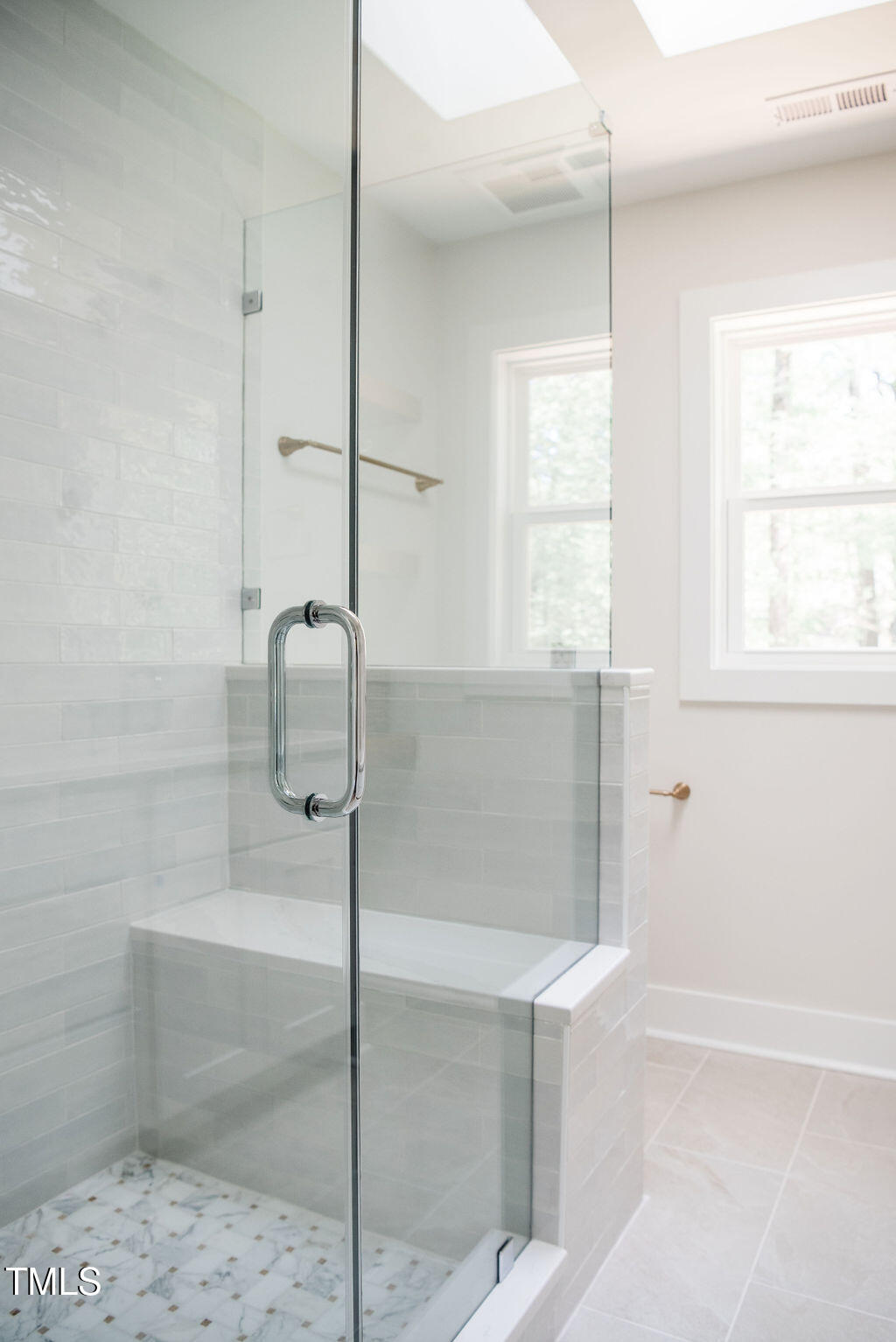 1326 Apache Lane Apex, NC 27502 - Photo 16 of 36 a bathroom with a shower