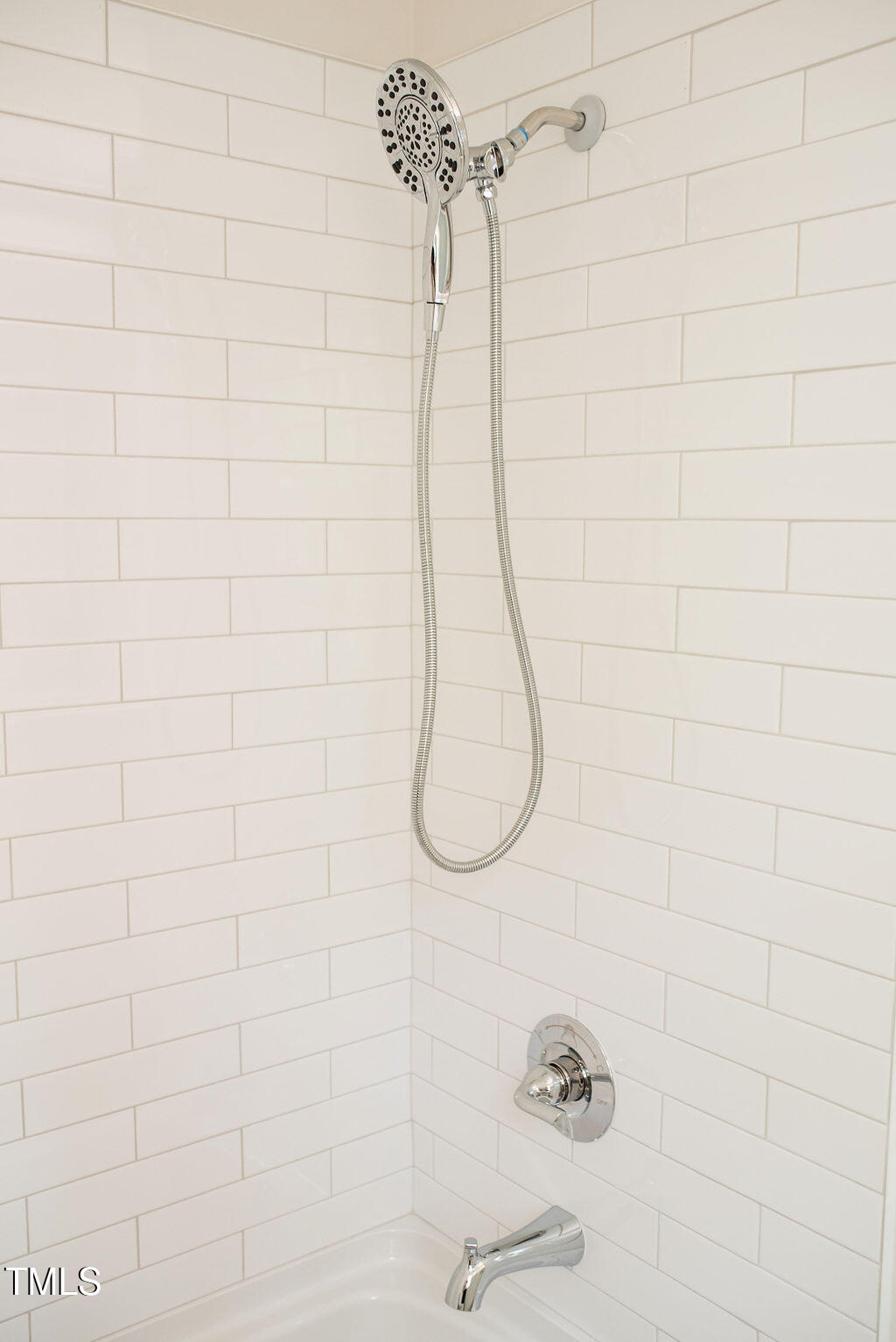 1326 Apache Lane Apex, NC 27502 - Photo 21 of 36 a bathroom with a shower