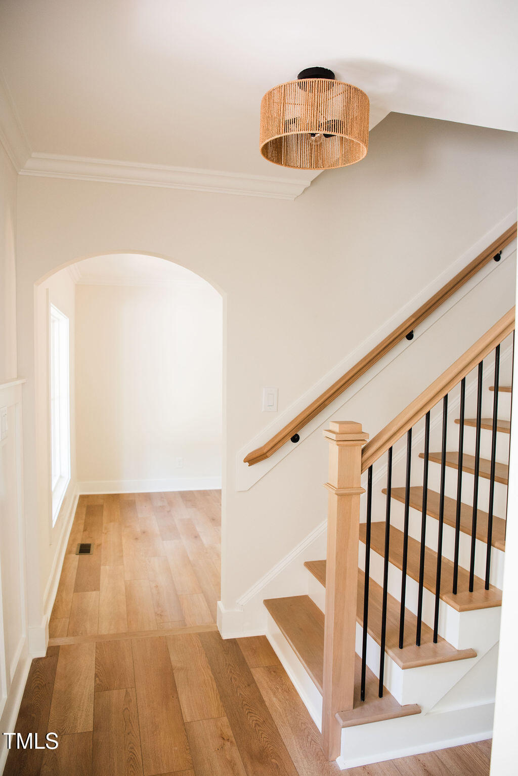 1326 Apache Lane Apex, NC 27502 - Photo 2 of 36 a view of a hallway with wooden floor and entryway