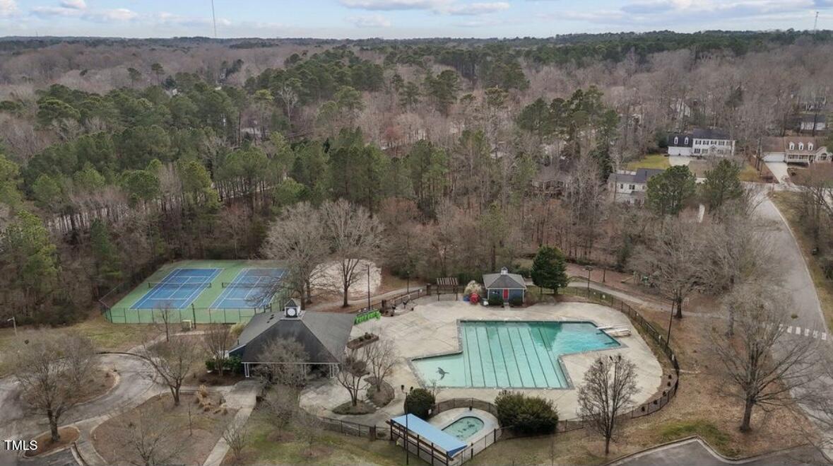 1326 Apache Lane Apex, NC 27502 - Photo 33 of 36 an aerial view of a gaming with trees