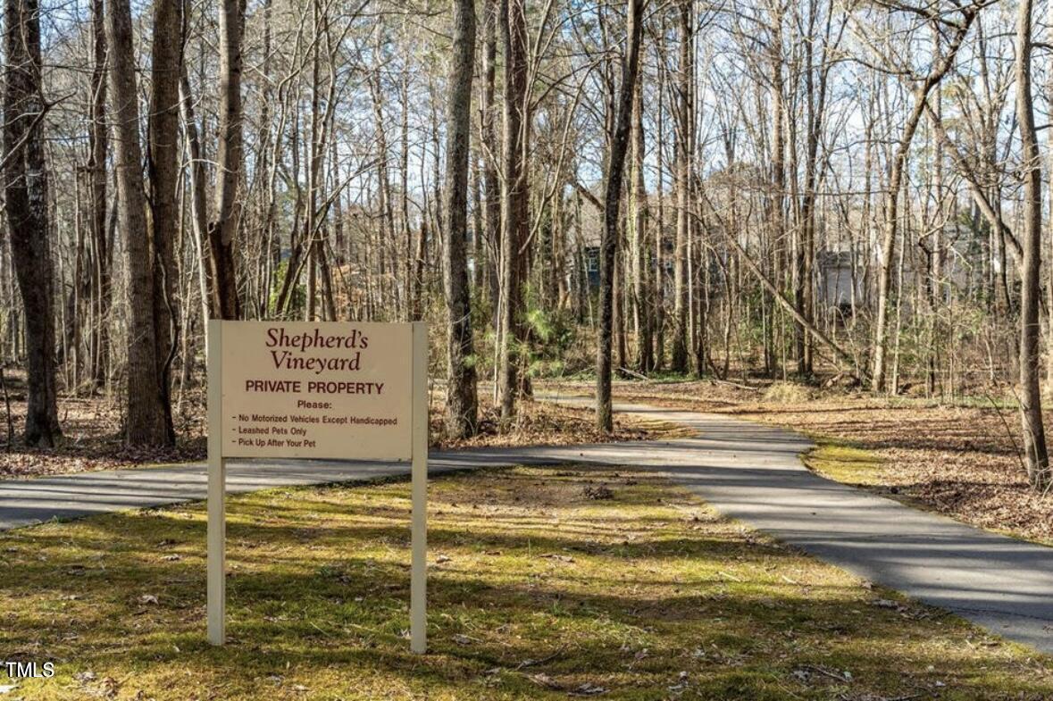 1326 Apache Lane Apex, NC 27502 - Photo 35 of 36 a view of swimming pool with a building in the background