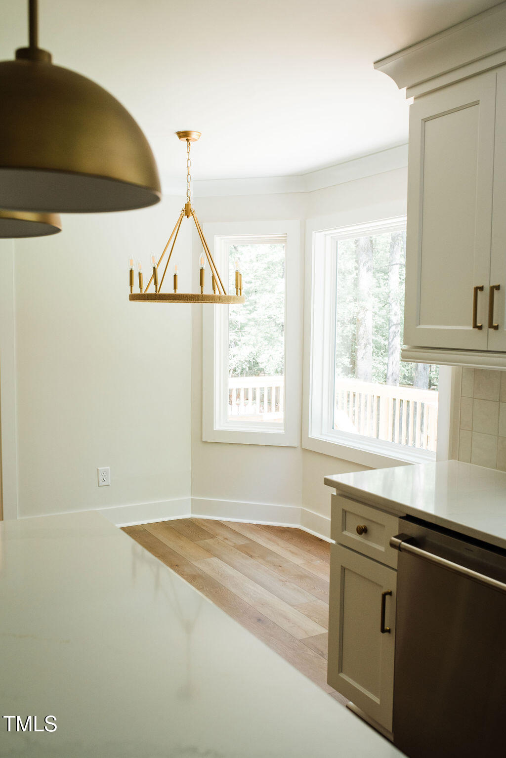 1326 Apache Lane Apex, NC 27502 - Photo 9 of 36 a view of a kitchen has a sink cabinets and a window
