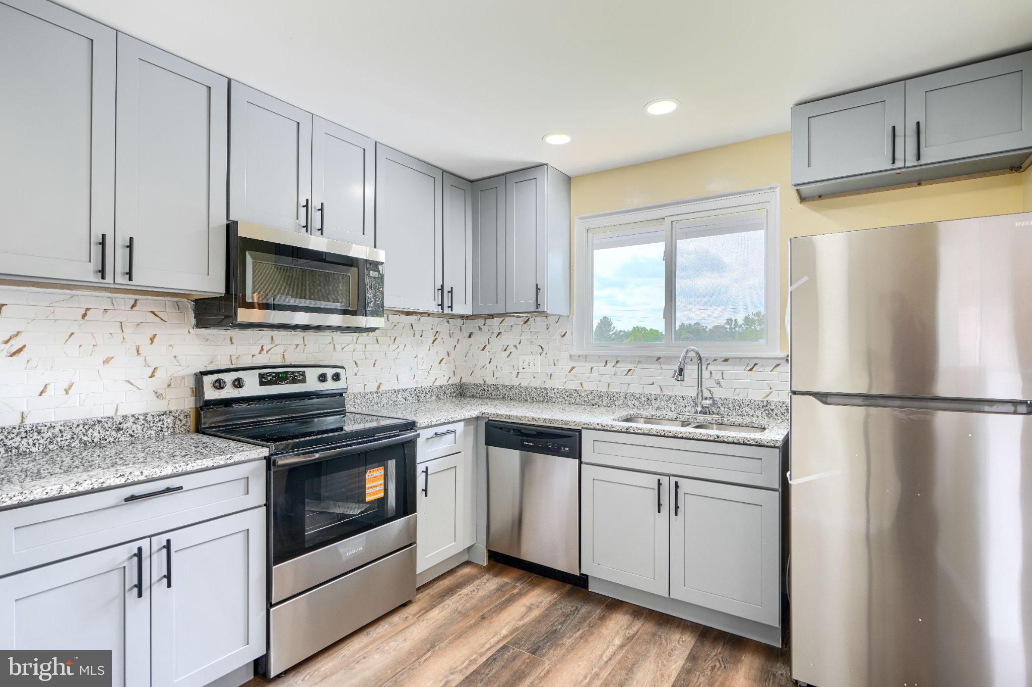 3910 Carthage Road Randallstown, MD 21133 - Photo 19 of 42 Modern kitchen with sleek finishes.