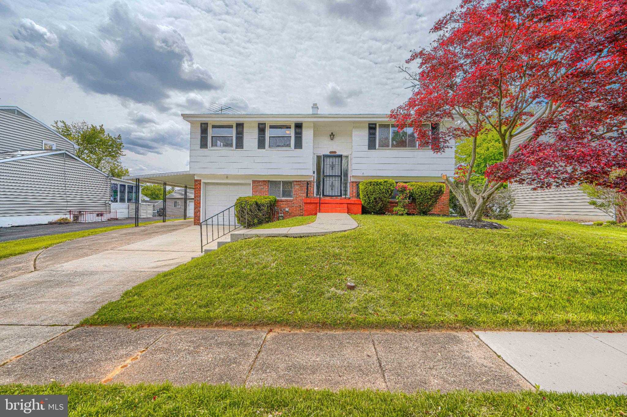 3910 Carthage Road Randallstown, MD 21133 - Photo 2 of 42 Charming home with vibrant landscaping.
