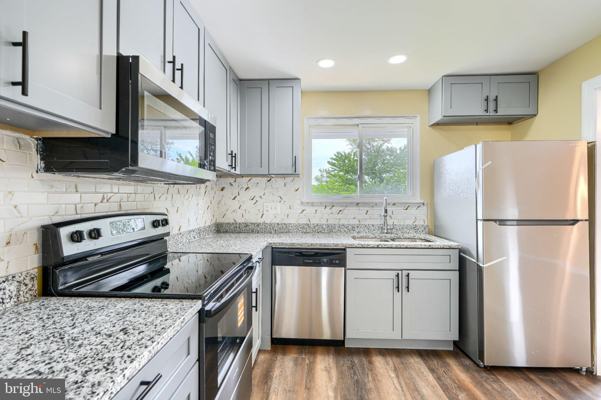 3910 Carthage Road Randallstown, MD 21133 - Photo 21 of 42 Modern kitchen with sleek finishes.