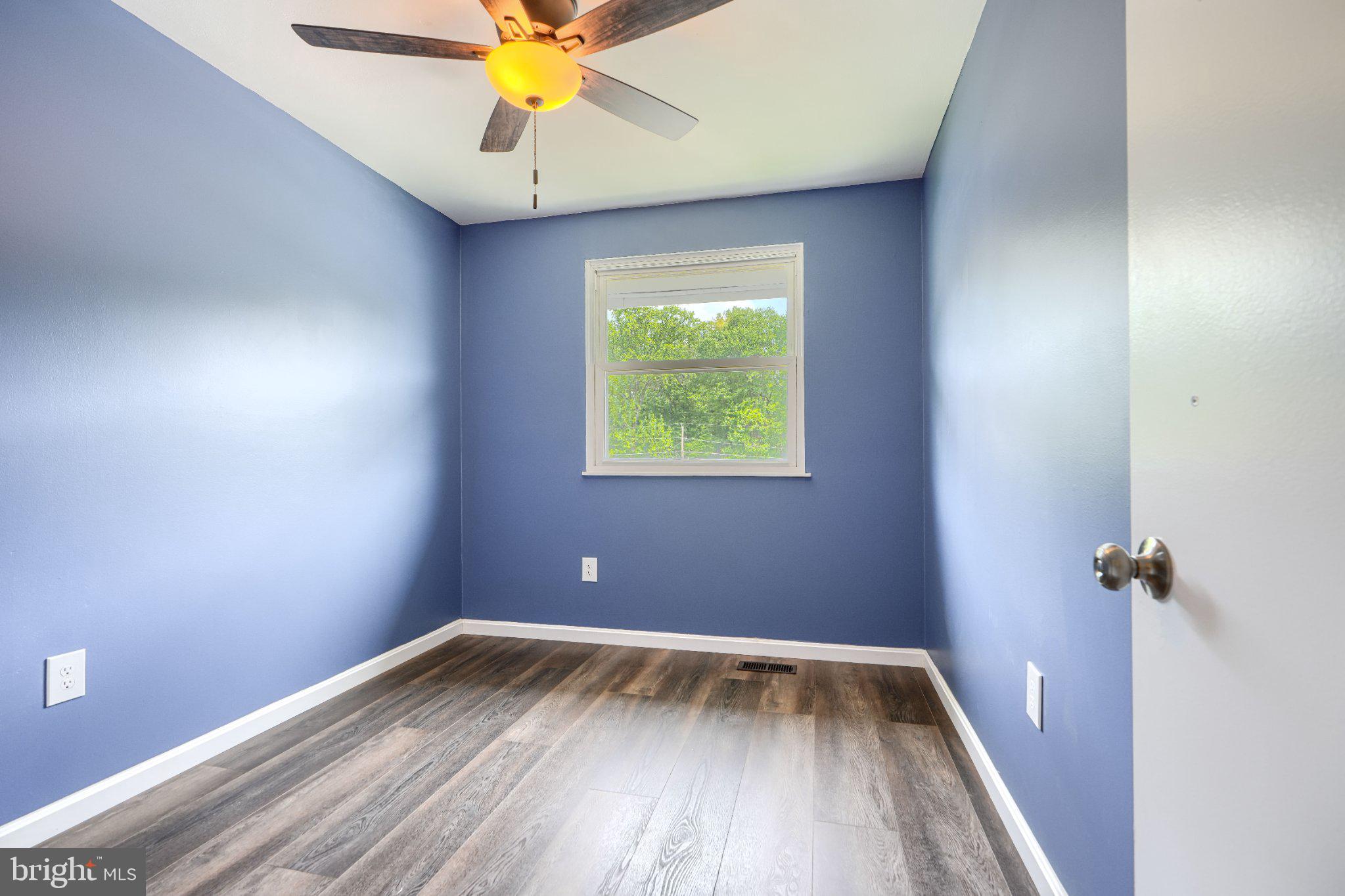 3910 Carthage Road Randallstown, MD 21133 - Photo 22 of 42 Serene blue room with natural light.