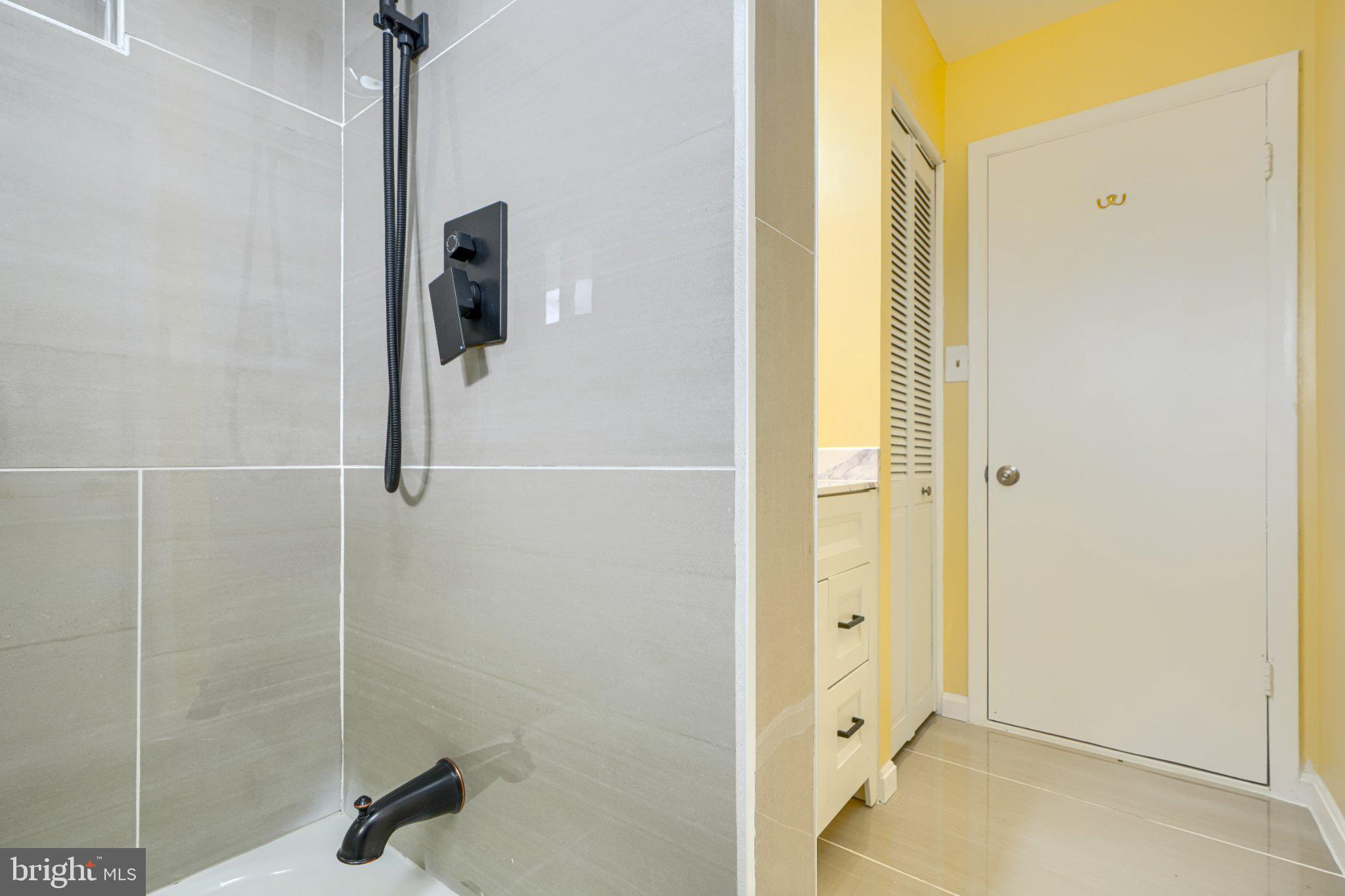 3910 Carthage Road Randallstown, MD 21133 - Photo 29 of 42 Modern bathroom with vibrant accents.