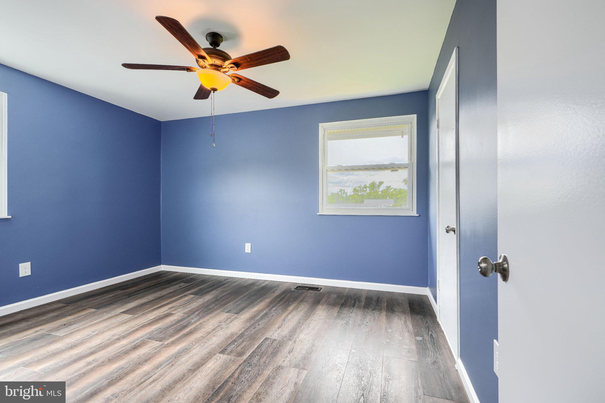 3910 Carthage Road Randallstown, MD 21133 - Photo 30 of 42 Bright blue room with modern charm.