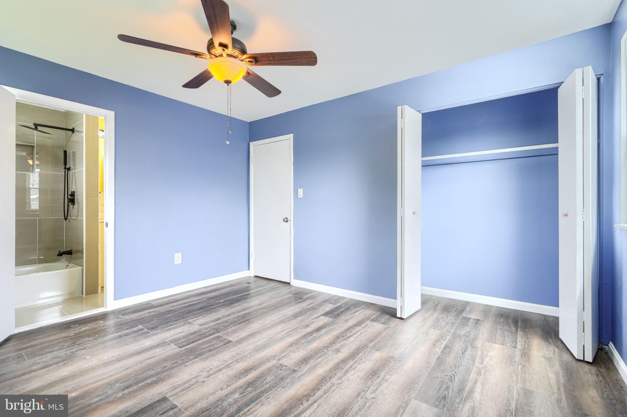 3910 Carthage Road Randallstown, MD 21133 - Photo 33 of 42 Bright and airy blue bedroom retreat.