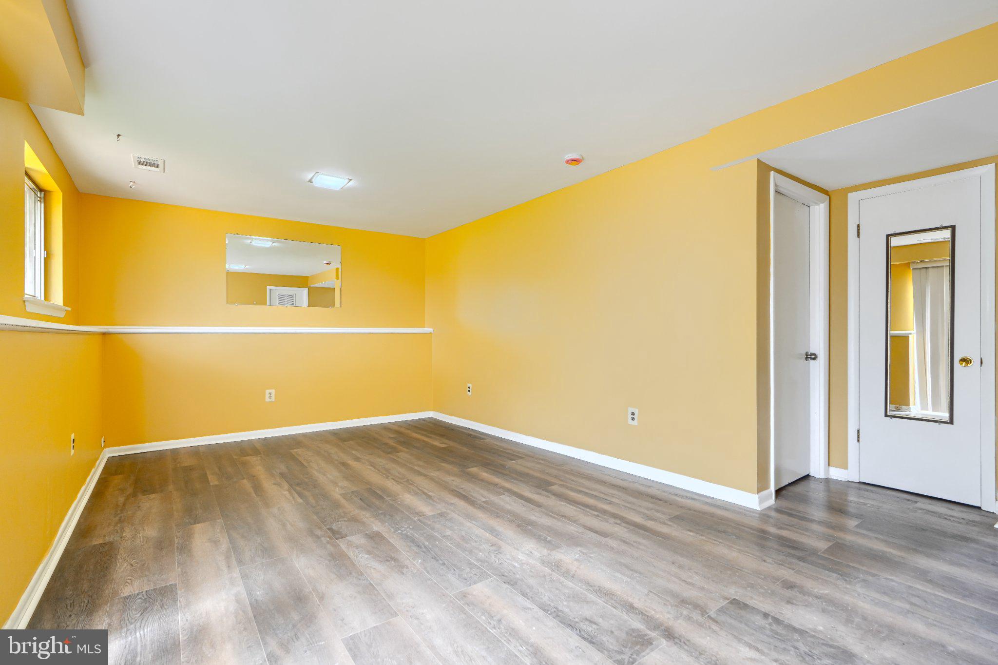 3910 Carthage Road Randallstown, MD 21133 - Photo 34 of 42 Bright and inviting yellow space.