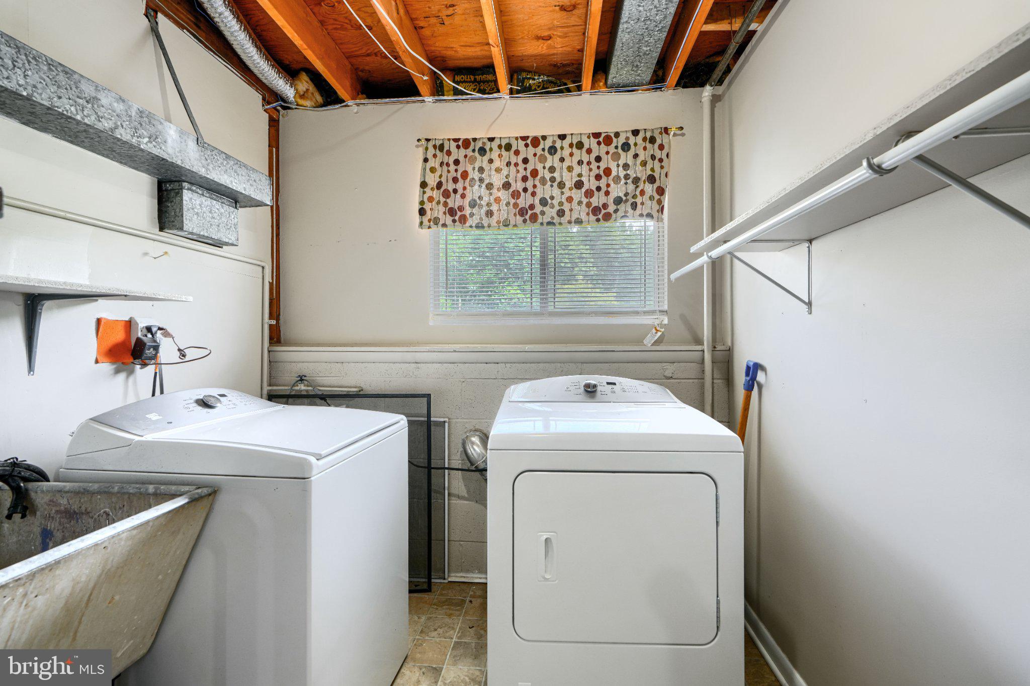 3910 Carthage Road Randallstown, MD 21133 - Photo 41 of 42 Bright and functional laundry space.
