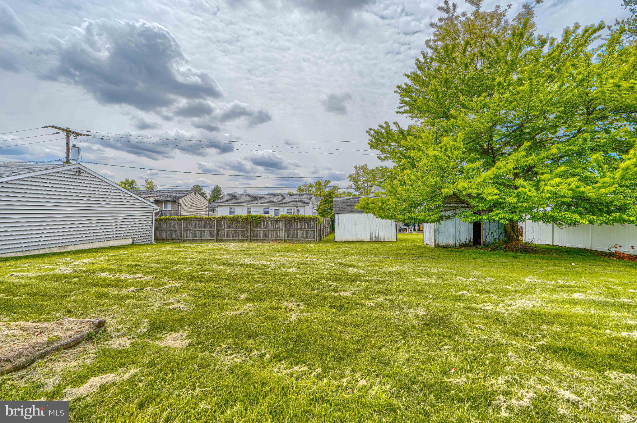3910 Carthage Road Randallstown, MD 21133 - Photo 6 of 42 Spacious yard with lush greenery.
