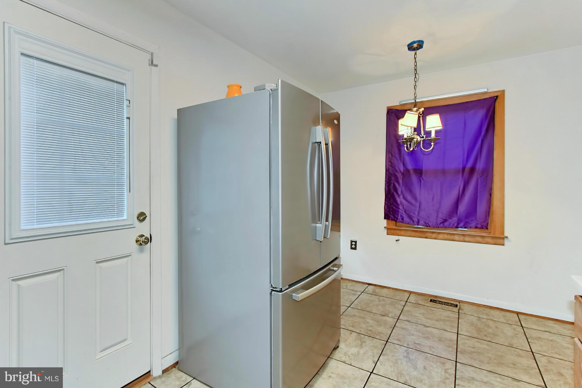 8126 Imperial Drive, Unit 5H Laurel, MD 20708 - Photo 11 of 30 a view of a hallway with painted walls