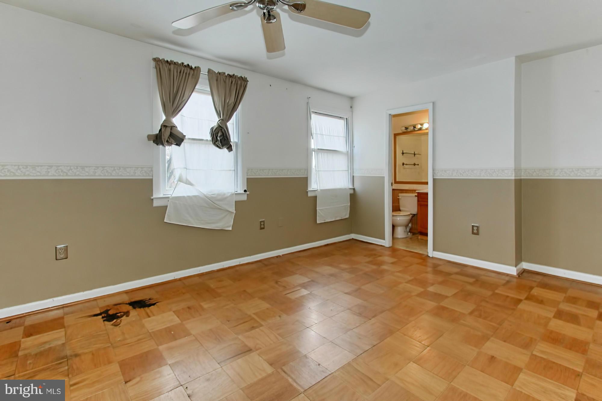 8126 Imperial Drive, Unit 5H Laurel, MD 20708 - Photo 15 of 30 a view of a room with window and wooden floor