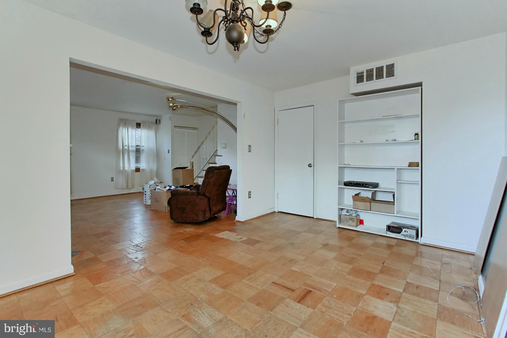 8126 Imperial Drive, Unit 5H Laurel, MD 20708 - Photo 7 of 30 a big room with closet and a chandelier