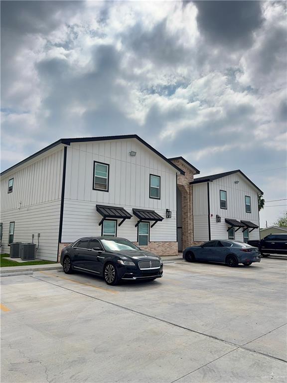 720 Ragland Road, Unit 3 Mission, TX 78572 - Photo 2 of 7 a car parked in front of a house