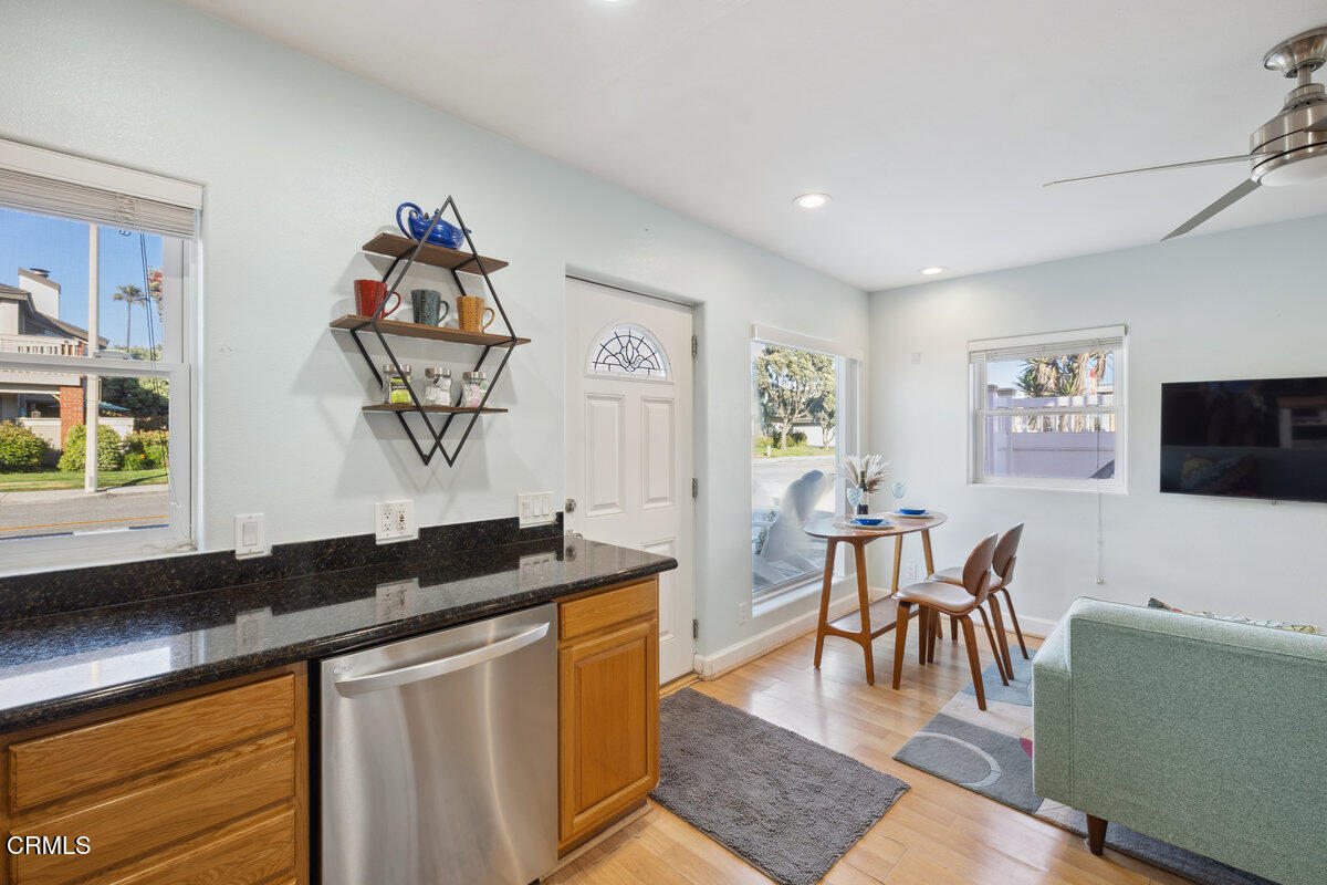3701 Sunset Lane Oxnard, CA 93035 - Photo 11 of 54 a living room with furniture and a flat screen tv