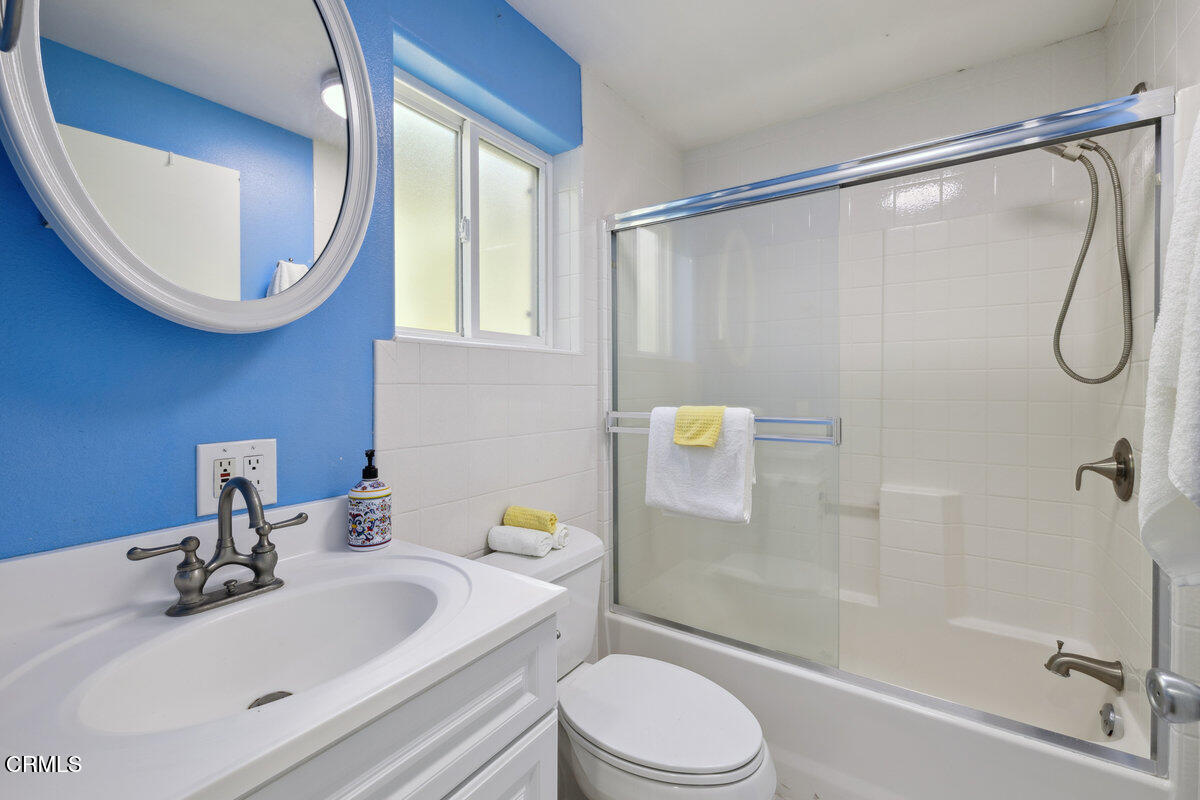 3701 Sunset Lane Oxnard, CA 93035 - Photo 16 of 54 a bathroom with a sink a toilet and a mirror
