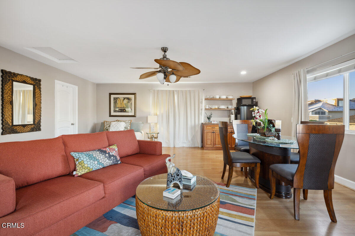 3701 Sunset Lane Oxnard, CA 93035 - Photo 18 of 54 a living room with furniture kitchen and a table