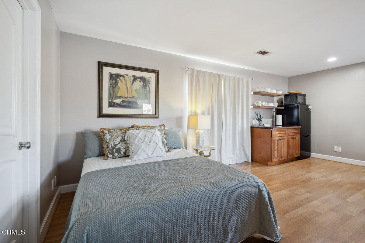 3701 Sunset Lane Oxnard, CA 93035 - Photo 24 of 54 a bedroom with a bed and a couch