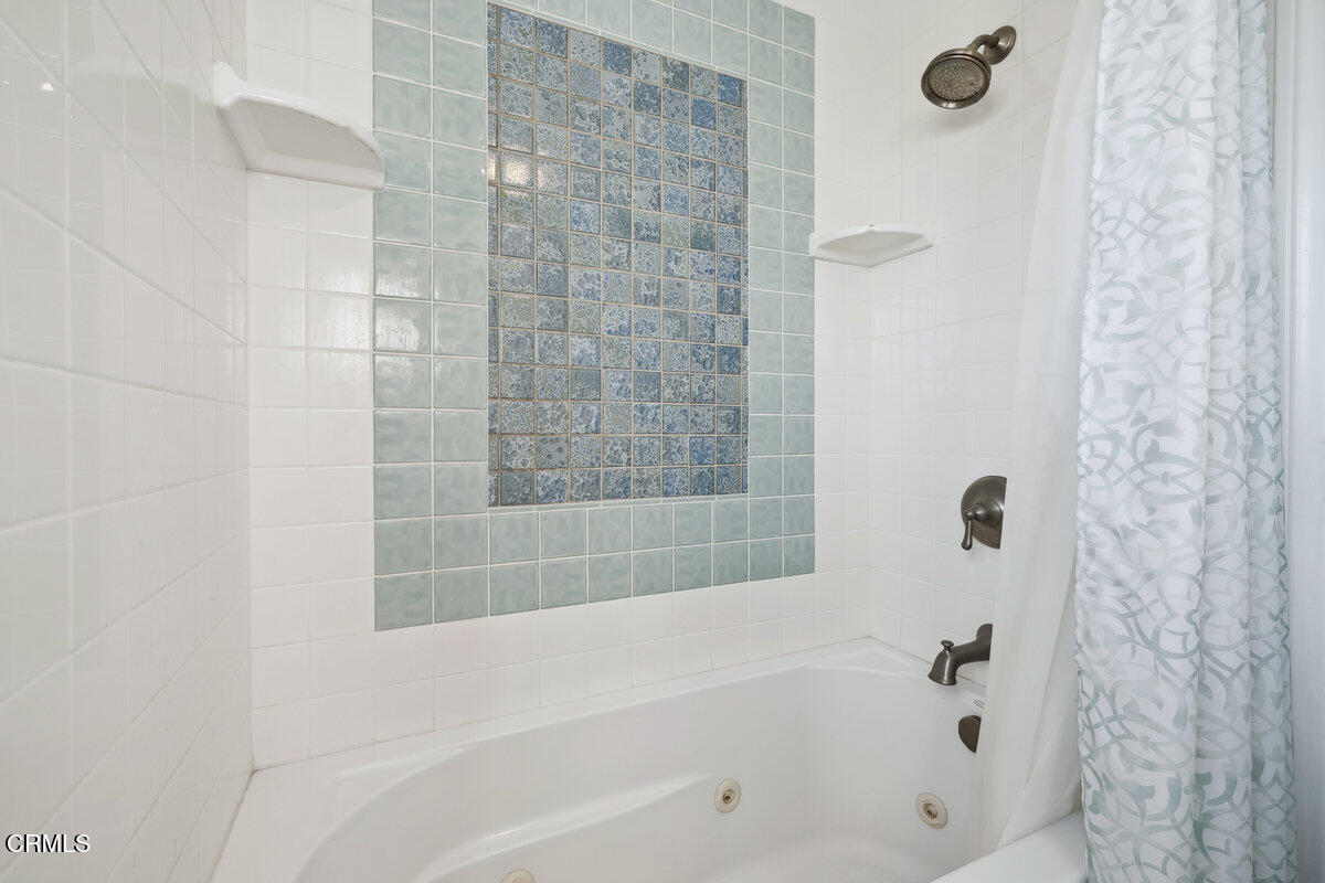 3701 Sunset Lane Oxnard, CA 93035 - Photo 26 of 54 a bathroom with a bathtub