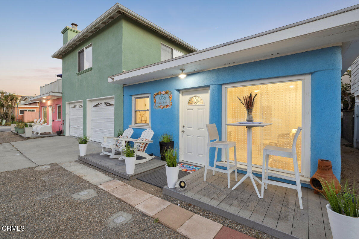 3701 Sunset Lane Oxnard, CA 93035 - Photo 36 of 54 a living room with furniture and a window