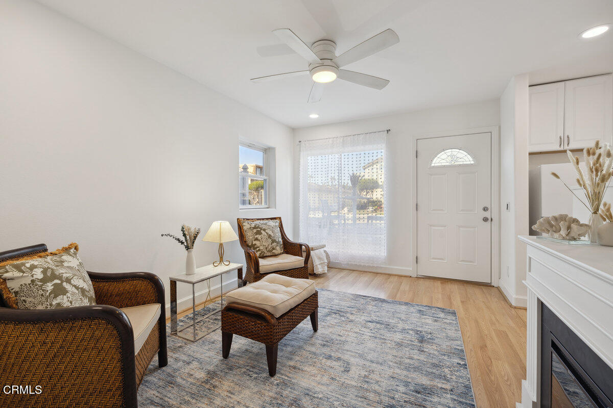 3701 Sunset Lane Oxnard, CA 93035 - Photo 38 of 54 a living room with furniture and a fireplace