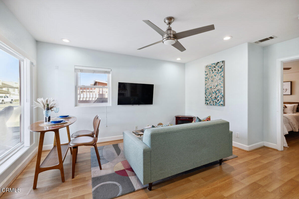 3701 Sunset Lane Oxnard, CA 93035 - Photo 4 of 54 a living room with furniture and a flat screen tv