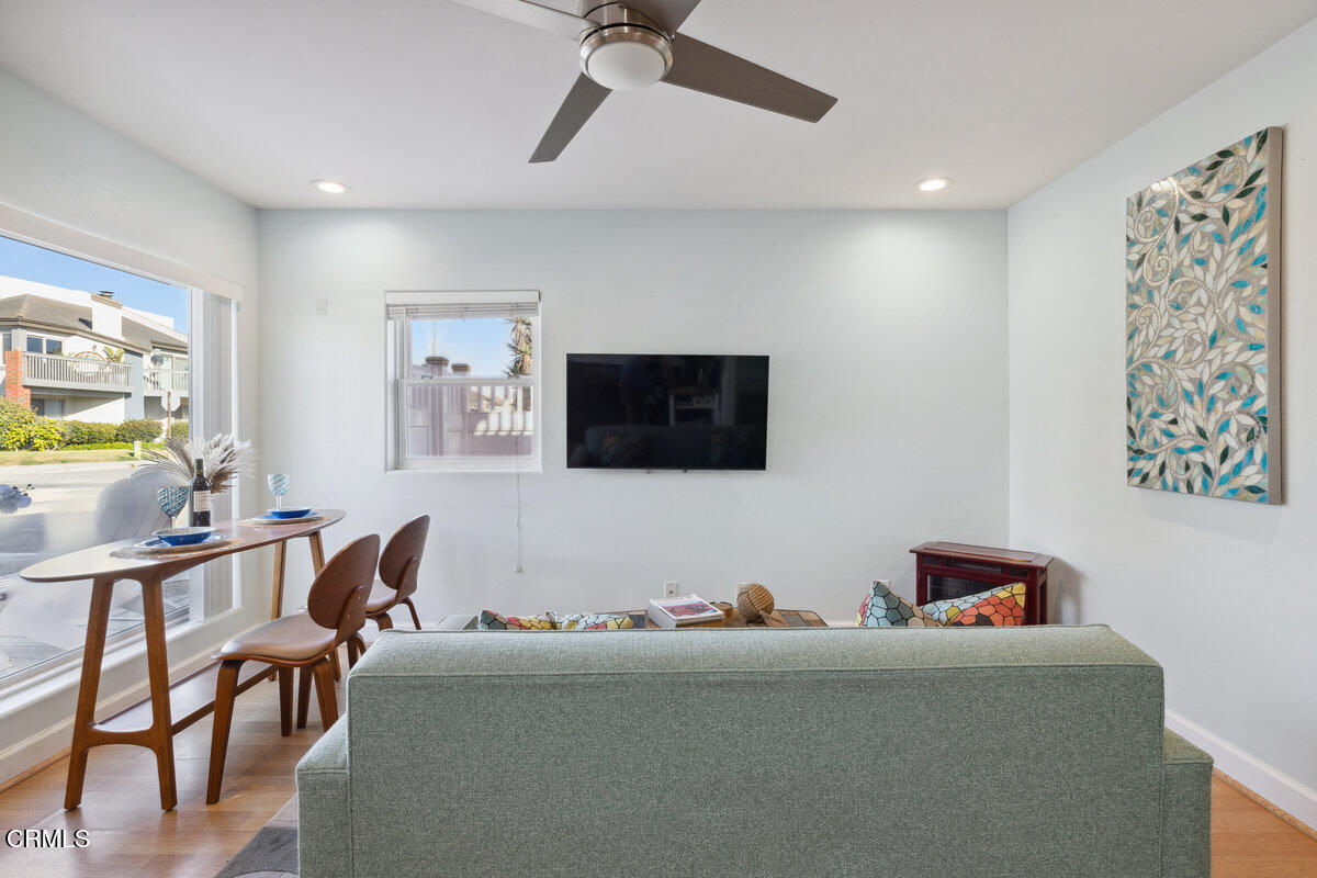 3701 Sunset Lane Oxnard, CA 93035 - Photo 7 of 54 a living room with furniture and a flat screen tv